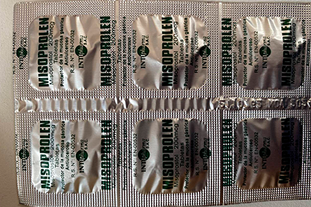 Pack view of a Misoprolen tablet, showcasing the front side, displaying distinctive markings and branding typical in Peru.